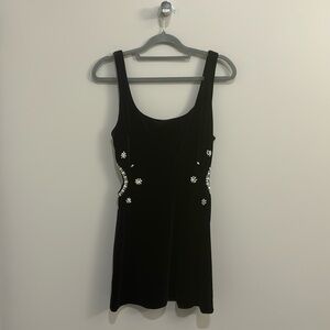 Beautiful black dress with embellished cutouts on the sides